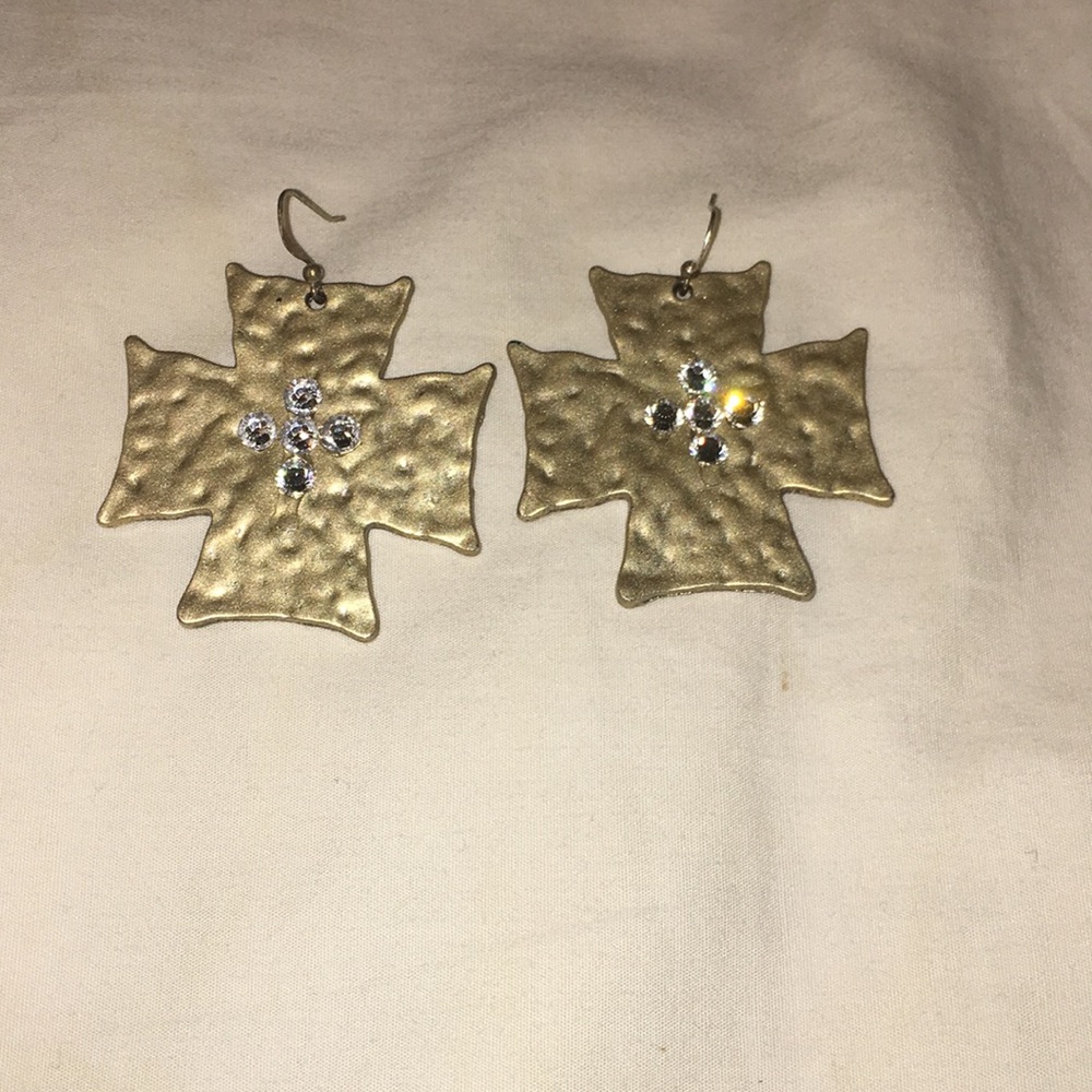 cream colored cross earrings with bling